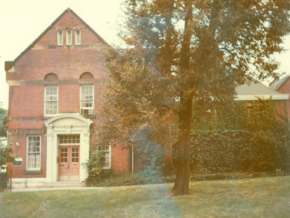 Archival photo of the Propylaeum's carriage house.